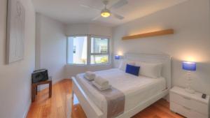 Krevet ili kreveti u jedinici u okviru objekta Maggies Beachfront Apartment 10