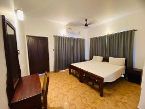 Imagen de la galería de Karma Beach Hotel, en Kovalam