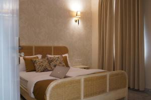 Ένα ή περισσότερα κρεβάτια σε δωμάτιο στο The Little Experience, Jaipur