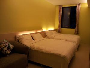 Postel nebo postele na pokoji v ubytování Haliluya Homestay + 7 fotografií