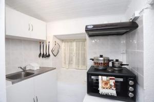Η κουζίνα ή μικρή κουζίνα στο Casa di Porta Remounda