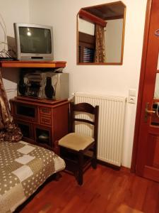 TV a/nebo společenská místnost v ubytování Anilio Casa 1