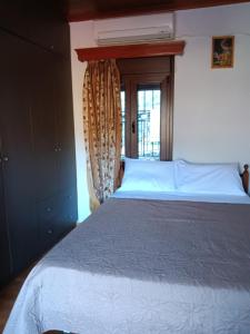 Postel nebo postele na pokoji v ubytování Anilio Casa 1