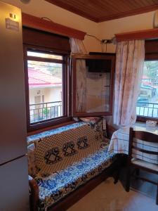 Postel nebo postele na pokoji v ubytování Anilio Casa 1