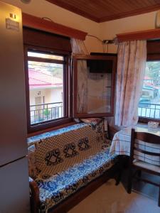 Postel nebo postele na pokoji v ubytování Anilio Casa 1