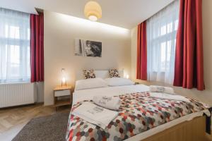 Posteľ alebo postele v izbe v ubytovaní Boutique Hotel Villa Beatika
