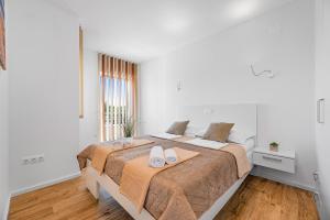 Ένα ή περισσότερα κρεβάτια σε δωμάτιο στο Villa Magdalena +91 φωτογραφίες