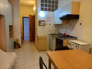 Kuchyň nebo kuchyňský kout v ubytování Residenza Lido Degli Estensi Affitti Brevi Italia