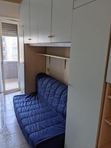 Postel nebo postele na pokoji v ubytování Residenza Lido Degli Estensi Affitti Brevi Italia