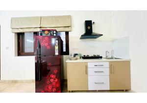 Kuchyň nebo kuchyňský kout v ubytování Olive Serviced Apartments - New Friends Colony