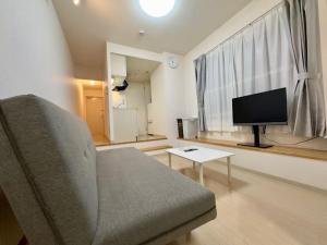 TV a/nebo společenská místnost v ubytování 401好立地札幌駅徒歩7分と大通駅徒歩6分で都心を満喫で綺麗な部屋で快適が生活が実現