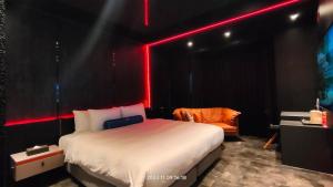 Voodi või voodid majutusasutuse Jiati Business Motel toas