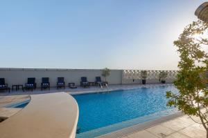 La pileta dentro o cerca de Safir Hotel Doha