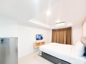 Gallery image of Cozy and Strategic Studio Apartment at De Prima By Travelio in Medan +11 photos
