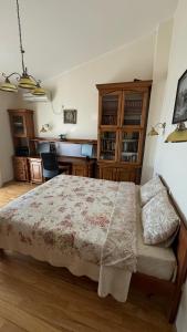 a bedroom with a bed and a desk at Villa Green Olive Bar in Šušanj +46 photos