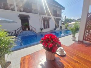 Bazén v ubytování Luang Prabang Pavilion Hotel & Travel nebo v jeho okolí