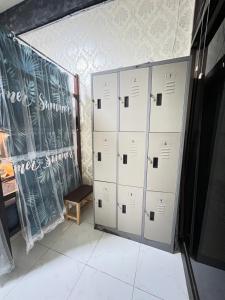 a group of lockers in a room with a table at BT @ Haadrin in Haad Rin