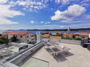 a view from the roof of a house with a patio at Villa Stella - CROWONDER LUXURY RENT in Turanj