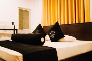 Postel nebo postele na pokoji v ubytování Abhaya Resorts
