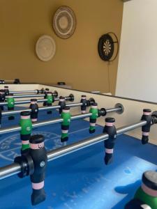 a row of billiard balls on a table at Walhalla Seahouse in Chã da Igreja
