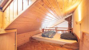 En eller flere senge i et værelse på VISONS - 11 - Studio Mezzanine 6 pers