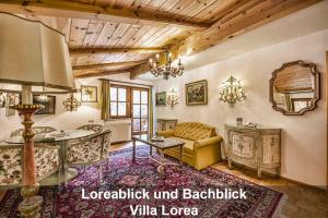 Uma área de estar em Schloss Hotel Fernsteinsee