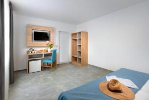 TV a/nebo společenská místnost v ubytování Martinez Hotel All Inclusive