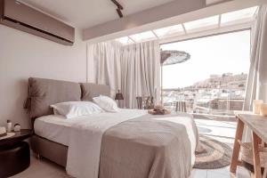 Kép Sunlit Suite with Jacuzzi & Acropolis View szállásáról Athénban a galériában