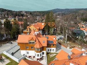 an overhead view of a large house with orange roofs at Apartament Dream View SPA in Szklarska Poręba