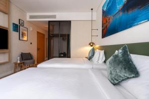Vuode tai vuoteita majoituspaikassa West Walk Retaj Hotel