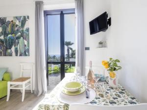 A television and/or entertainment centre at Apartment Le Margherita - SLR266 by Interhome
