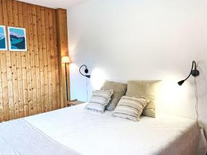 Cama o camas de una habitación en Apartment Parc C013 by Interhome