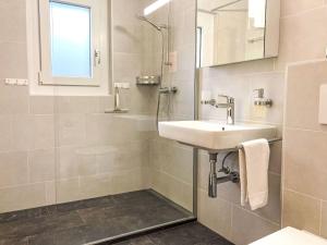 Un baño de Apartment Parc C013 by Interhome
