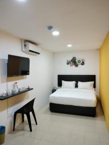 Postel nebo postele na pokoji v ubytování Rex City Hotel + 22 fotografií