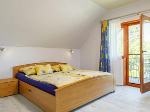 Postel nebo postele na pokoji v ubytování Holiday Home Narcisse by Interhome