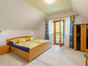 Postel nebo postele na pokoji v ubytování Holiday Home Narcisse by Interhome
