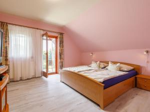 Postel nebo postele na pokoji v ubytování Holiday Home Narcisse by Interhome