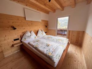 Postel nebo postele na pokoji v ubytování Holiday Home Hettegg Lehen by Interhome