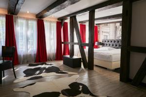 Postel nebo postele na pokoji v ubytování Hotel im Haus zur Hanse