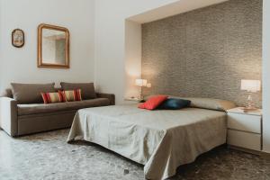 Postel nebo postele na pokoji v ubytování Liddo Boutique hotel