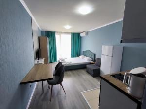 A bed or beds in a room at Apartments in Panorama Beach Vigo Nessebar