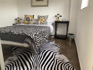 Cama o camas de una habitación en Casa Dolly Boutique B&B