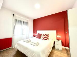 Ein Bett oder Betten in einem Zimmer der Unterkunft Ever House - ALCALA DIVA 1 ROOFTOP