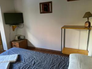 Postel nebo postele na pokoji v ubytování Casa Campo
