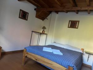 Postel nebo postele na pokoji v ubytování Casa Campo