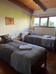 Postel nebo postele na pokoji v ubytování Casa Campo