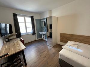 Postel nebo postele na pokoji v ubytování Hotel Drei Könige