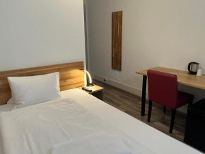 Postel nebo postele na pokoji v ubytování Hotel Drei Könige