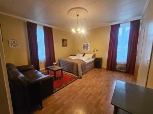 Postel nebo postele na pokoji v ubytování Eides Hotel