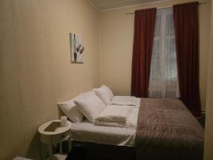 Postel nebo postele na pokoji v ubytování Eides Hotel